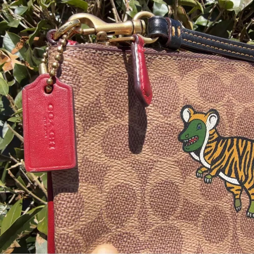 EUC Coach Small Wristlet In Signature Canvas With Tiger Rexy C8395 - Picture 2 of 9